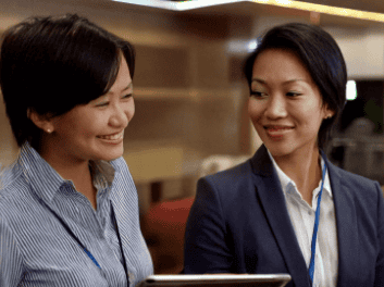 Business people meeting in a large business foyer